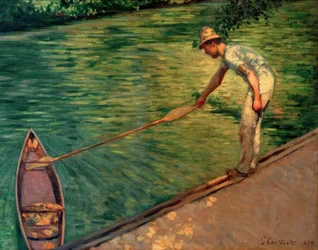 Canottiere che riporta la sua barca
