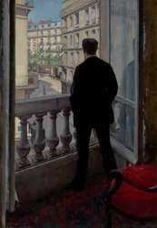 Giovane uomo alla finestra