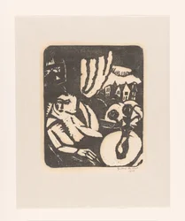 Donna seduta vicino a una finestra