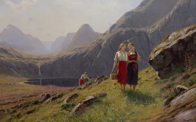 Tre ragazze presso il lago di montagna nella Norvegia occidentale