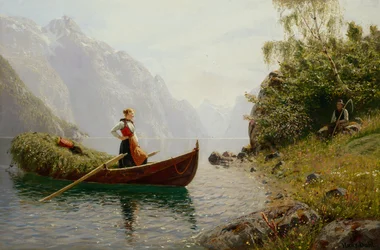 Donna e uomo nel paesaggio del fiordo