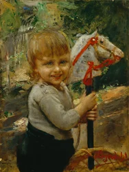 Ragazzo con cavallo a dondolo