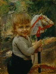 Ragazzo con cavallo a dondolo
