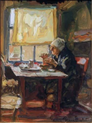 Vecchia donna al tavolo della colazione