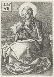 Madonna con bambino al seno