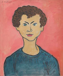 Ritratto con capelli ricci, maglione blu marino