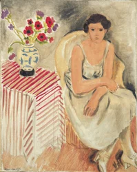 Donna su una sedia - Fiori sul tavolo o garofani