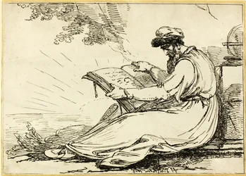 Orientale con barba, che legge un libro