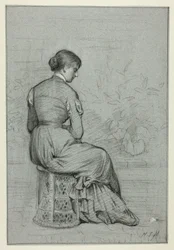 Donna seduta su un tabouret