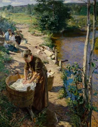 Donne delle pulizie in riva al fiume