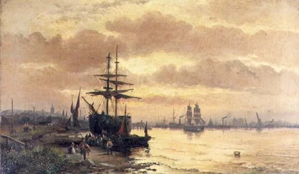Pescatori sulla riva di un estuario al tramonto