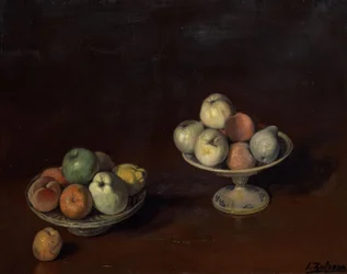 Fruttiera e piatto di mele