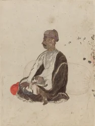 Figura di uomo seduto