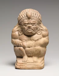 Sonaglio a forma di Yaksha grottesco accovacciato