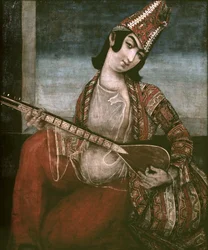 Giovane donna che suona una chitarra