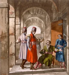 Uomini georgiani che chiacchierano e fumano in un