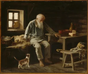 Vecchio con il suo gatto