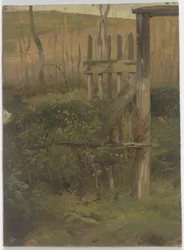 Cancello del giardino che conduce al campo