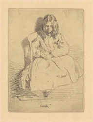 Annie, seduta