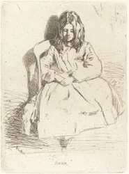 Annie seduta