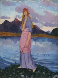 Ragazza in piedi vicino a un lago