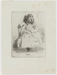 Annie, seduta