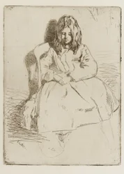 Annie, seduta