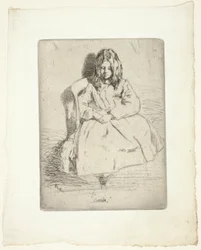 Annie, seduta