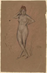 Nudo in piedi con gambe incrociate