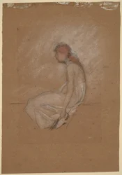 Donna seduta con capelli rossi