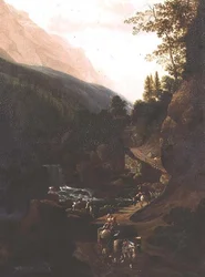 Muli su un sentiero di montagna vicino a un torrente