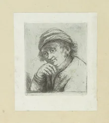 Uomo con la mano sotto il mento
