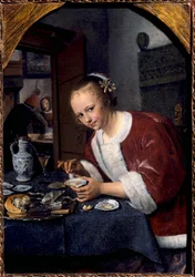 Giovane ragazza che mangia ostriche