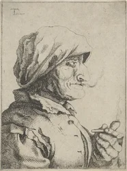Vecchia donna che fuma una pipa