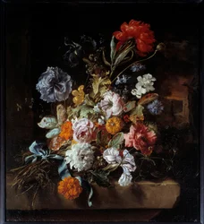 Bouquet di fiori deposto su una panchina di pietra