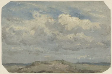 Cima di una duna con il mare sullo sfondo