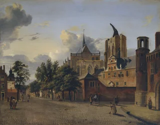Una strada a Colonia con la cattedrale incompiuta al centro