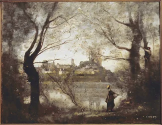 Mantes, cattedrale e città viste attraverso gli alberi, sera