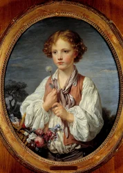 Ragazzo giovane nel cesto di fiori