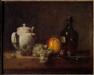 La teiera bianca con uva