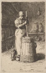 Donna che sbatte il burro