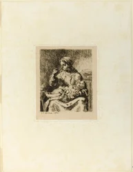Donna che allatta il suo bambino