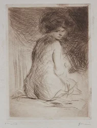 Donna nuda seduta di schiena
