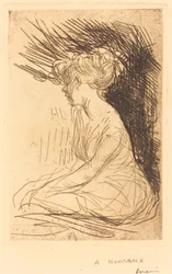 Donna seduta di profilo