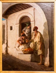 Mercante di arance in un vicolo orientale