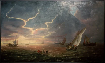 Barche a vela in mare mosso al tramonto
