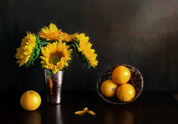 Girasoli dorati e arance