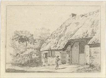 Uomo con una vanga vicino a una fattoria