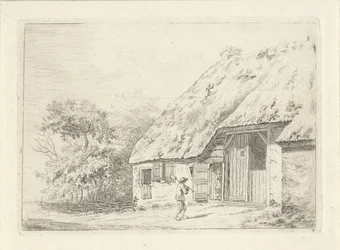 Uomo con una vanga presso una fattoria