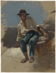 Giovane seduto con cappello di feltro